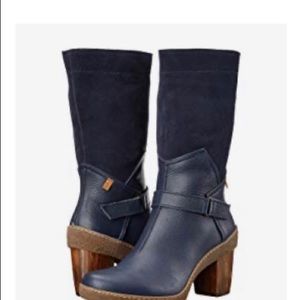 Mid Calf Navy boot with heel. Almost new!